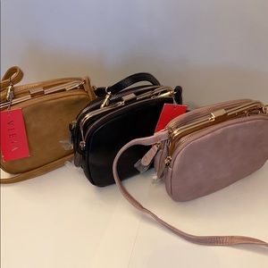 New leather shoulder bags with metal pushlocks